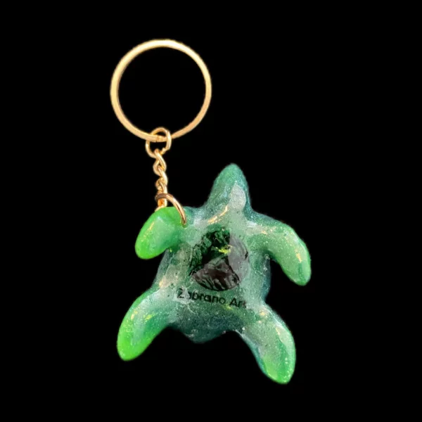 derrière de la tortue verte carapace en relief chaine or