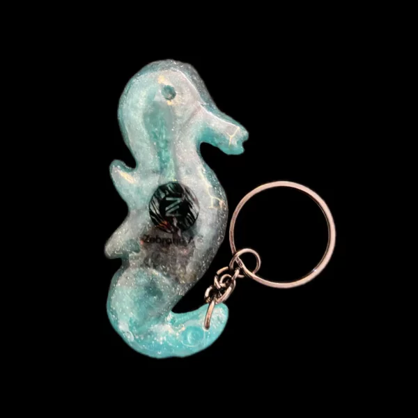 hippocampe porte clés bleu turquoise avec logo