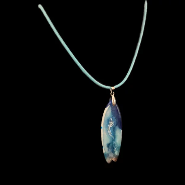 pendentif surf fond noir